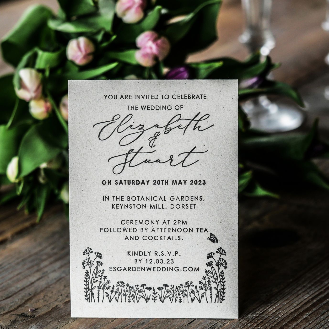 Garden wedding invite with tulip bouquet